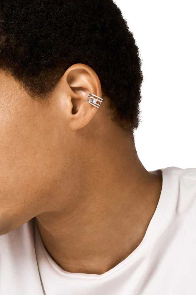 Stainless steel ear cuff features the D logo in a wrapped design