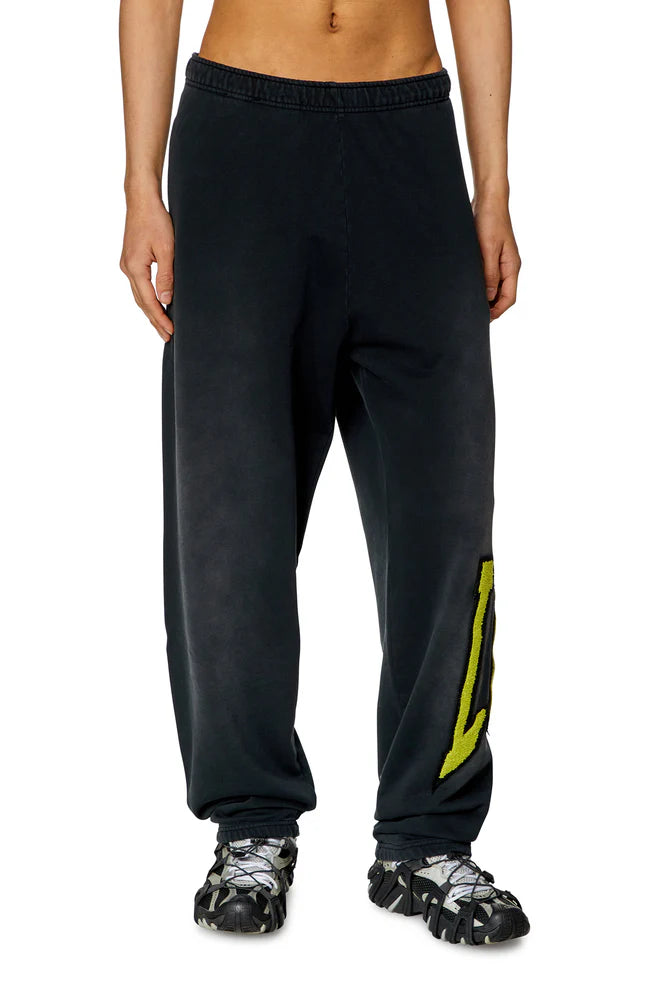 College track pants with LIES patches