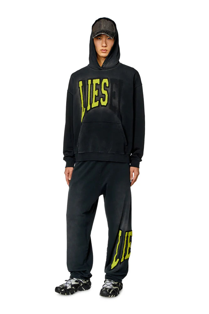 College track pants with LIES patches