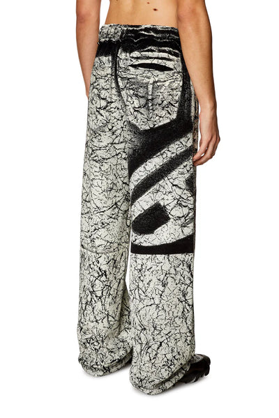 Track pants with cracked coating